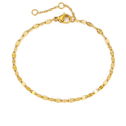 Adjustable stainless steel bracelet in gold color with oval links and secure clasp, isolated product shot.