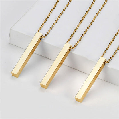 Trio of minimalist gold square bar stainless steel necklaces displayed on a white marble background.